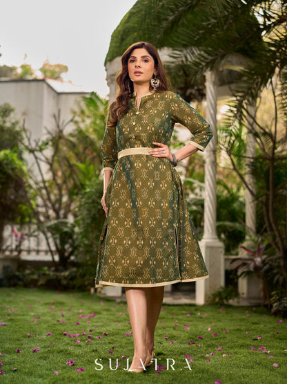 Statement olive green two-tone Ikat dress elevated with cream and gold accents, a structured belt for definition, and a subtle left-front slit.