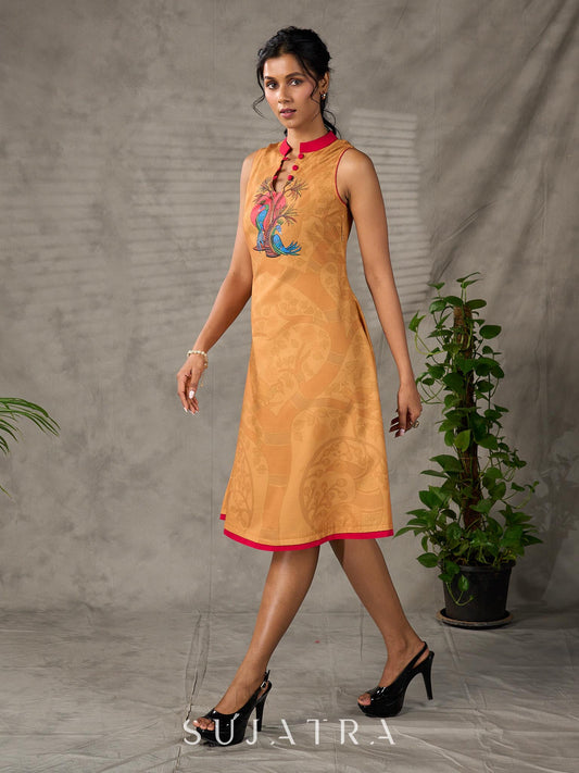 Mustard Gond printed mandarin collar dress with vibrant pink accents.