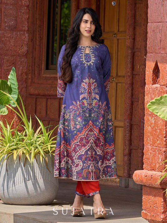 Stunning royal blue printed kurta adorned with handcrafted zardozi and sequin detailing on the keyhole neck.