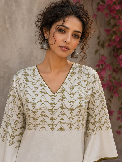 Contemporary off white and olive hand block print top features subtle geometric motifs, airy bell sleeves, and effortless elegance for versatile everyday styling.