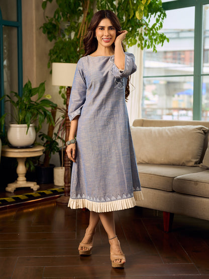 Two-tone handloom cotton dress with delicately painted Madhubani fish motifs and pleated hem.