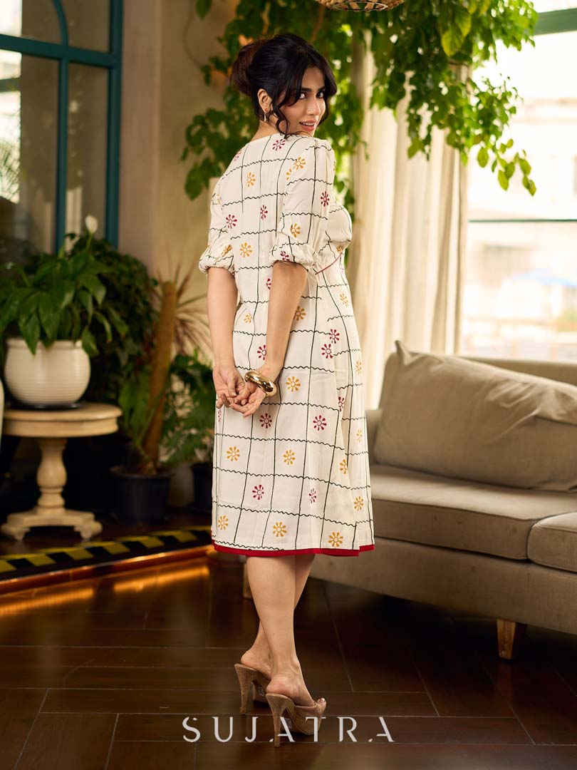 Soft off-white block printed rayon dress with intricate all-over hand block printed checks and florals, a gently gathered yoke, and rich red accents for a refined, elegant everyday look.