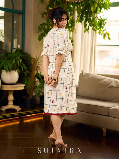 Soft off-white block printed rayon dress with intricate all-over hand block printed checks and florals, a gently gathered yoke, and rich red accents for a refined, elegant everyday look.