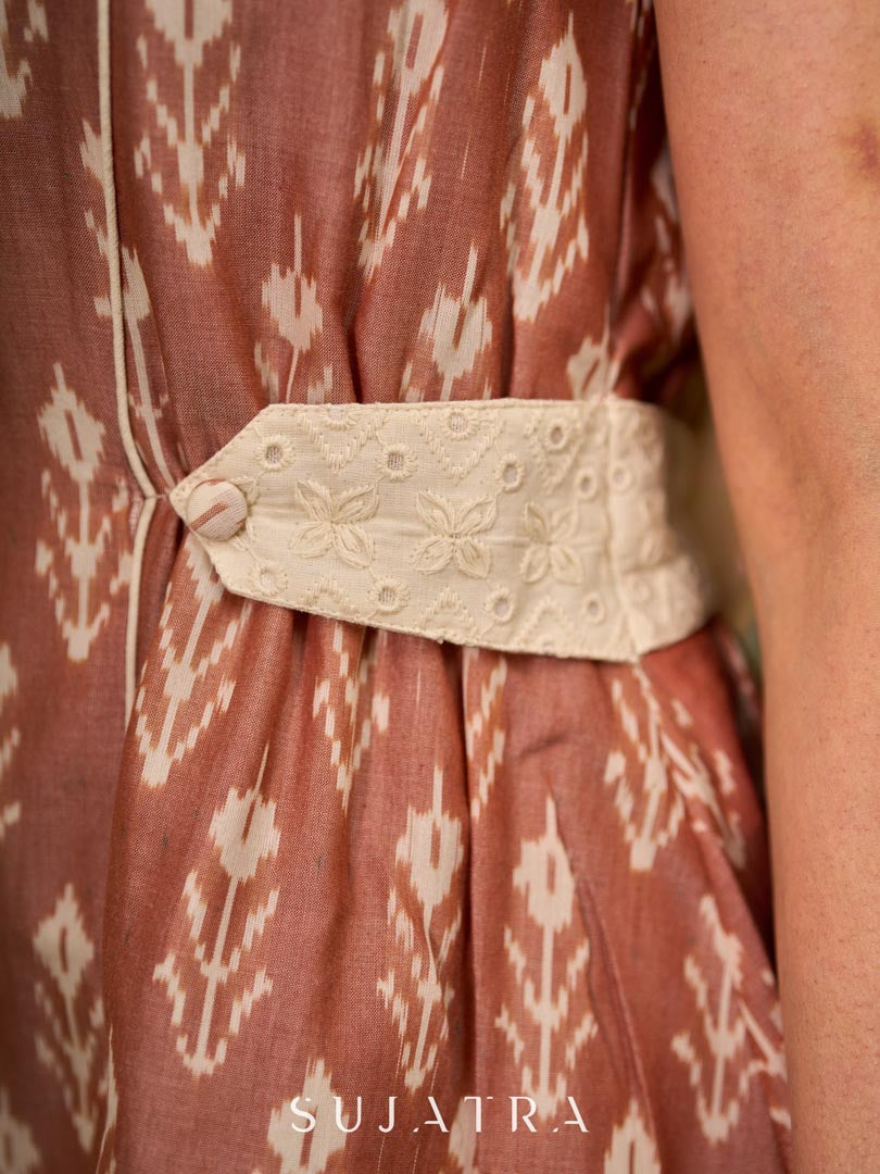 Chic champagne beige Ikat dress elevated with Hakoba accents, a relaxed drop-shoulder fit, mandarin neckline, and fluid side gathers detailed with Hakoba flaps.