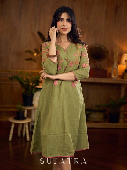 Muted pista hand block printed dress with delicate cascading hand block floral motifs and soft pink accents for a graceful, elegant, and refreshing everyday look.