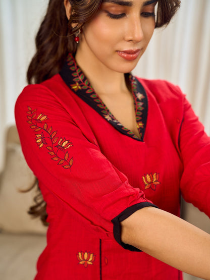 Elegant red dress featuring delicate, hand-painted Madhubani lotus motif detailing.