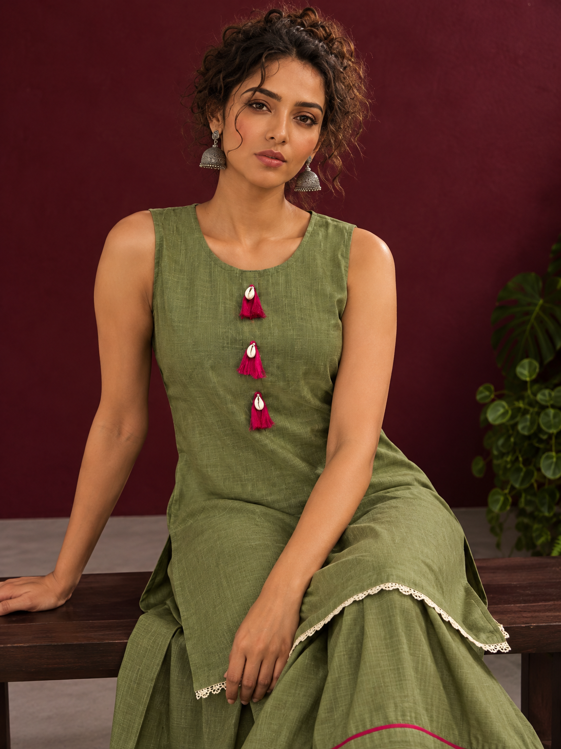 Sage Green Cotton Co-Ord Set with Pink Tassel Shell Buttons and Lace Trim Farshi Salwar — seated detail — view 6