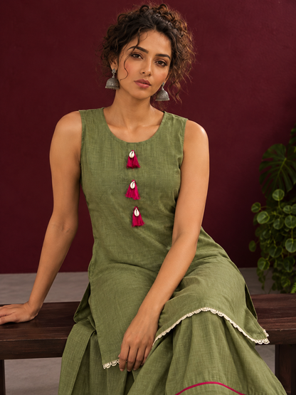 Sage Green Cotton Co-Ord Set with Pink Tassel Shell Buttons and Lace Trim Farshi Salwar — seated detail
