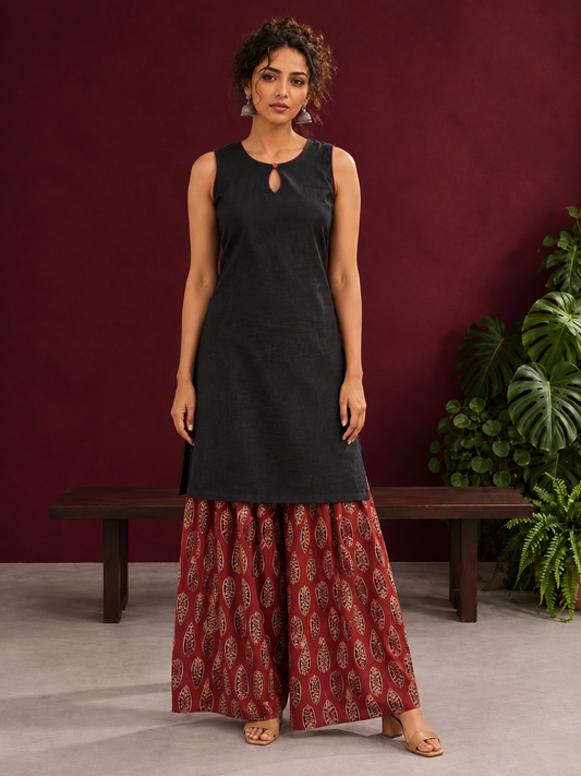 Black Sleeveless Keyhole Neck Tunic Co-Ord Set with Maroon Ajrakh Printed Cotton Farshi Salwar — front view