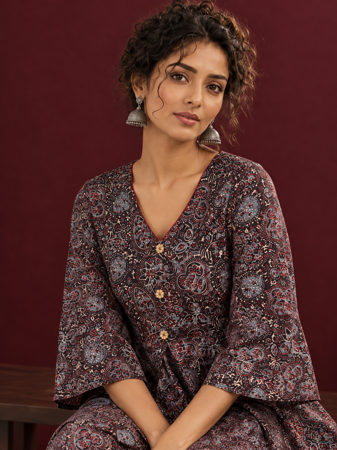 Black Ajrakh Print Cotton Tunic Co-ord Set with Maroon Cotton Straight Pant — seated detail — view 7