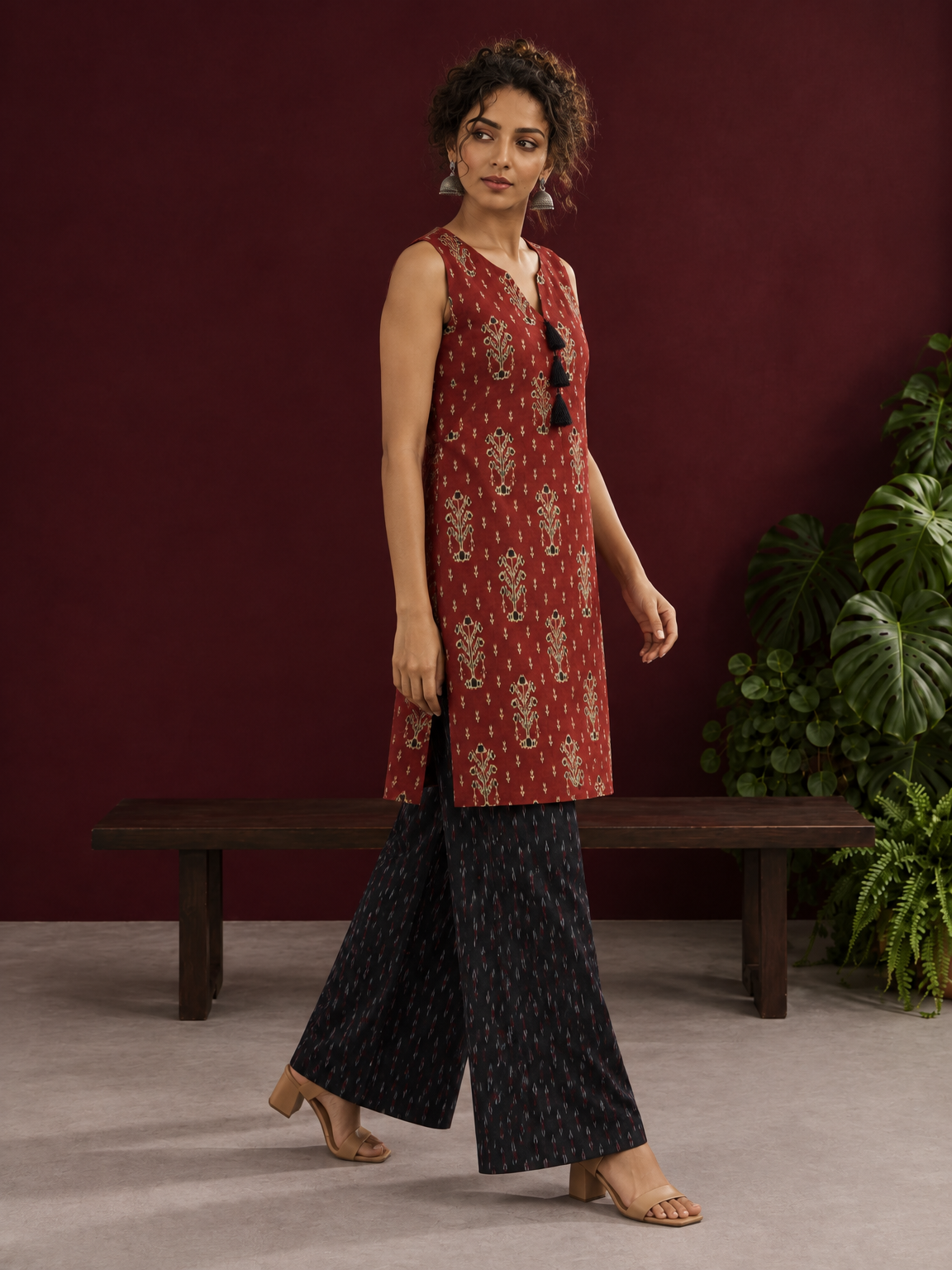 Rustic Maroon Cotton Ikat Printed Sleeveless Tunic Co-ord Set with Black Ikat Straight Pant — in motion — view 4