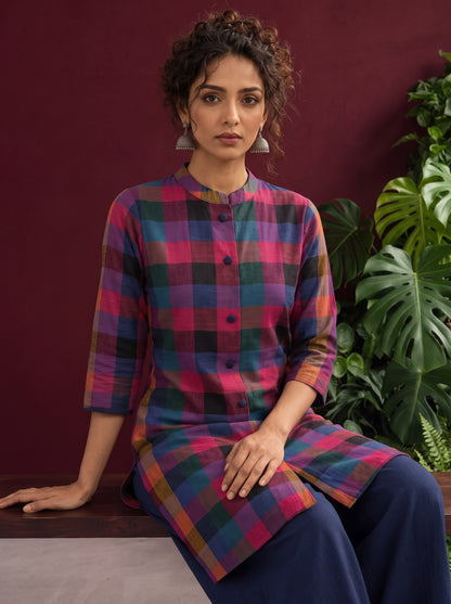 Madras checks Cotton Co ord with Mandarin Collar and Contrast Navy Button Placket and navy blue Farshi Salwar — seated detail