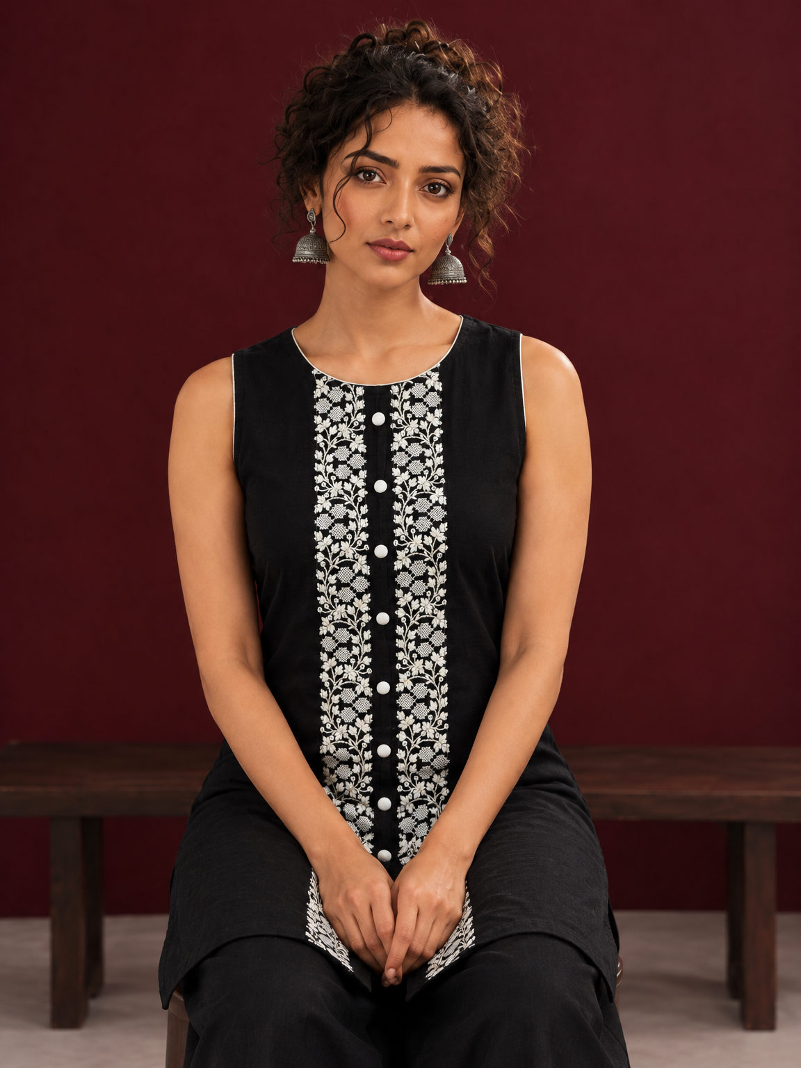 Elegant Black Cotton Sleeveless Coord with White Floral lace Front Placket & Buttons with black palazzo pants — seated detail — view 5