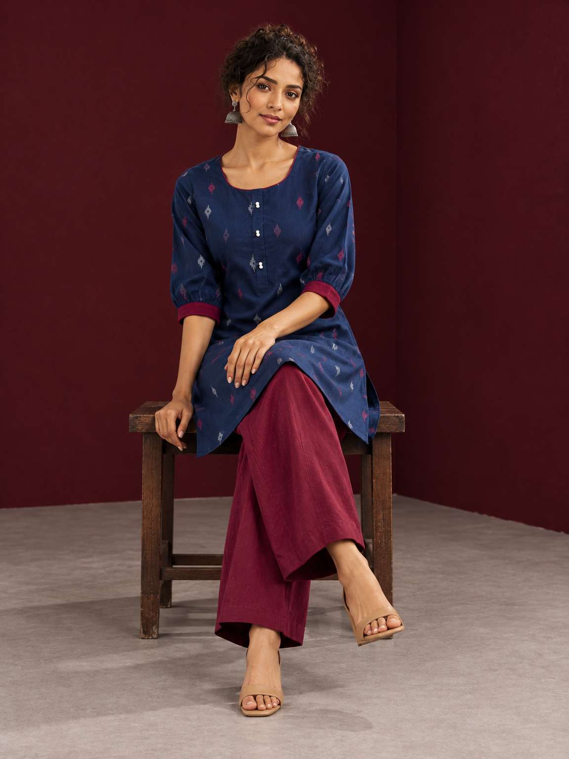 Navy Blue Cotton Co-Ord Set with Maroon Contrast Cuffs and Scoop Neckline Piping and maroon Farshi pants — seated — view 7