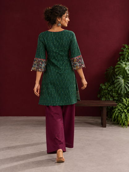 Bottle Green Ikat Cotton Co-Ord Set with Kalamkari Peacock Print Border on Sleeves and Hem with Maroon Farshi Col — back view