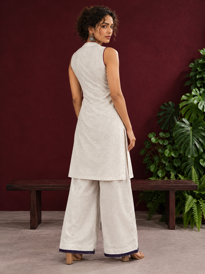 Elegant Off-White Cotton Co-Ord Set with Navy printed Front Panel & Contrast Maroon Piping — back view