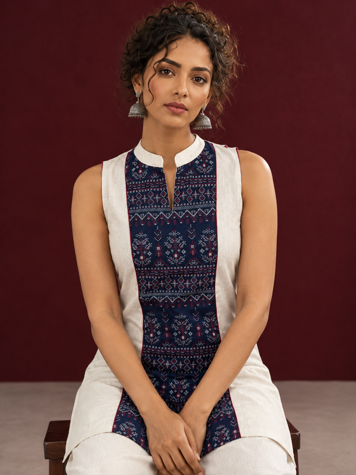 Elegant Off-White Cotton Co-Ord Set with Navy printed Front Panel & Contrast Maroon Piping — seated detail — view 6