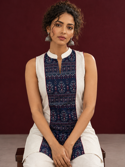 Elegant Off-White Cotton Co-Ord Set with Navy printed Front Panel & Contrast Maroon Piping — seated detail