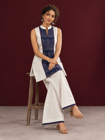 Elegant Off-White Cotton Co-Ord Set with Navy printed Front Panel & Contrast Maroon Piping — seated