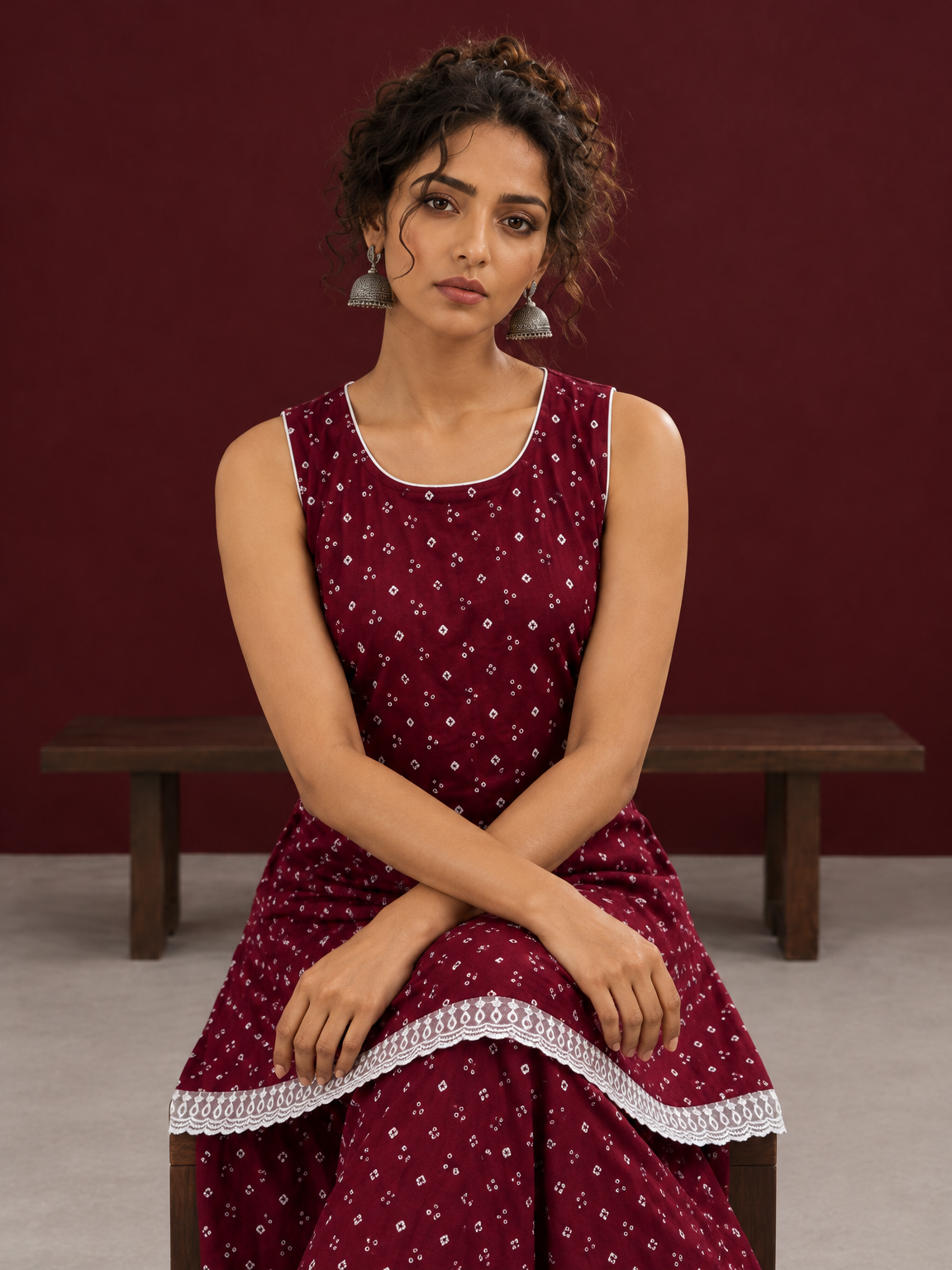 Elegant Maroon Bandhani Print Co-Ord Set with Lace Trim Hem and Scoop Neckline — seated detail — view 4