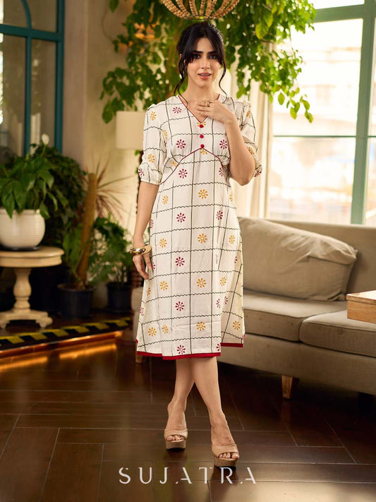 Soft off-white block printed rayon dress with intricate all-over hand block printed checks and florals, a gently gathered yoke, and rich red accents for a refined, elegant everyday look.