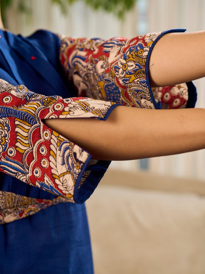 Navy Blue Artisanal Kalamkari prints enhanced with statement sleeves and a waist-defining knotted Kalamkari belt.