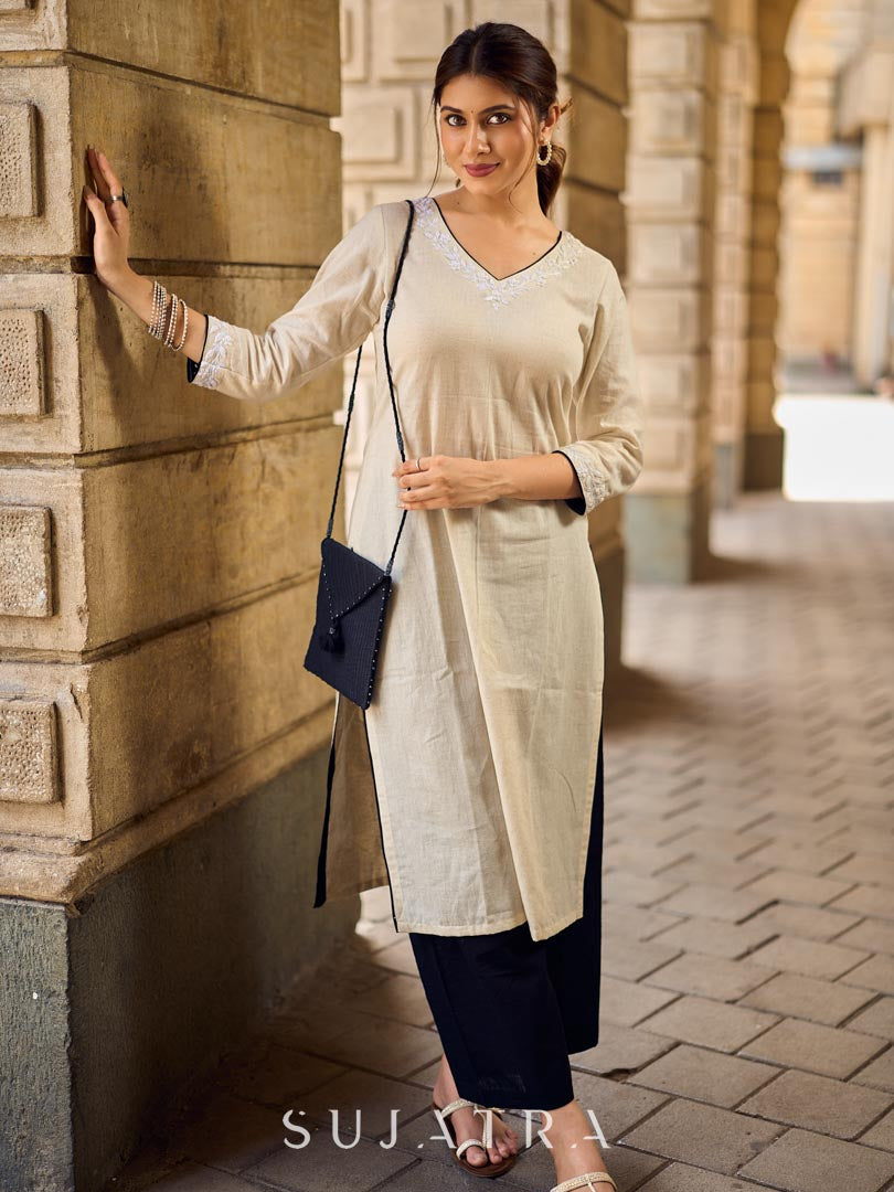 Pristine Off-White Cotton Flex Straight Kurta Featuring Subtle Monochrome Embroidery on Neckline & Sleeve Cuffs