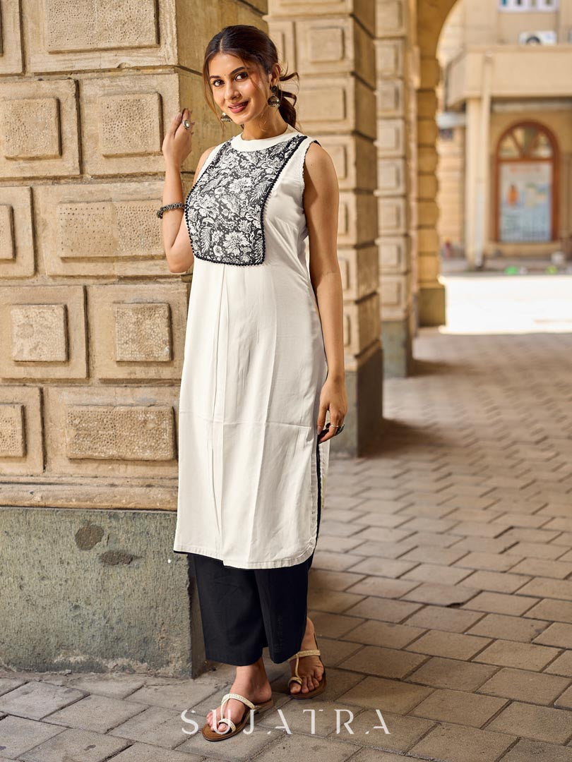 Elegant Off-White Rayon Sleeveless Kurta with Contrast Black Floral Embroidered Yoke Panel