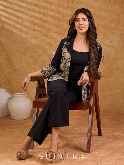 Elegant black and navy Kalamkari jacket featuring a notch collar and subtle navy accents, creating a graceful, tailored silhouette suited for polished corporate wear.