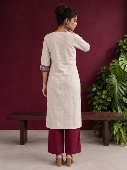 Timeless Off-White Cotton Kurta with Handpainted Madhubani overlapping Neckline & Matching Sleeve Cuffs — back view