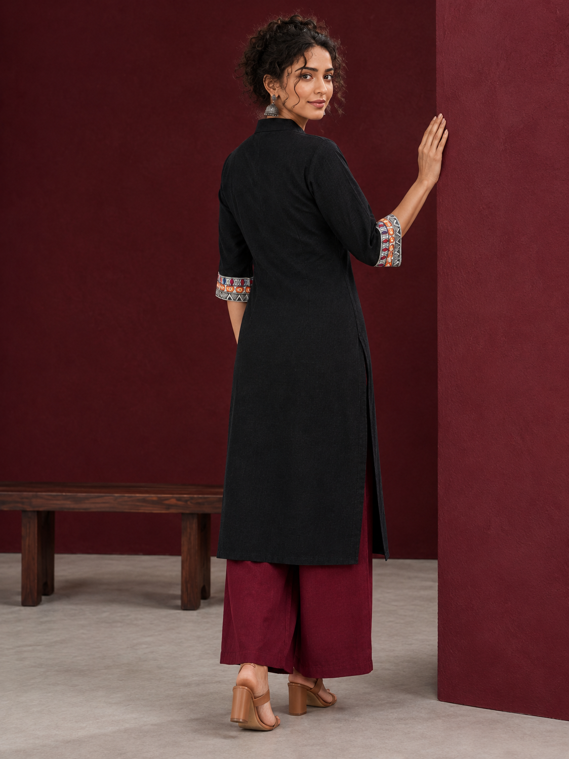 Classic Black Cotton Kurta with hand painted Madhubani neck panels & Matching Sleeve Cuffs — back view — view 2