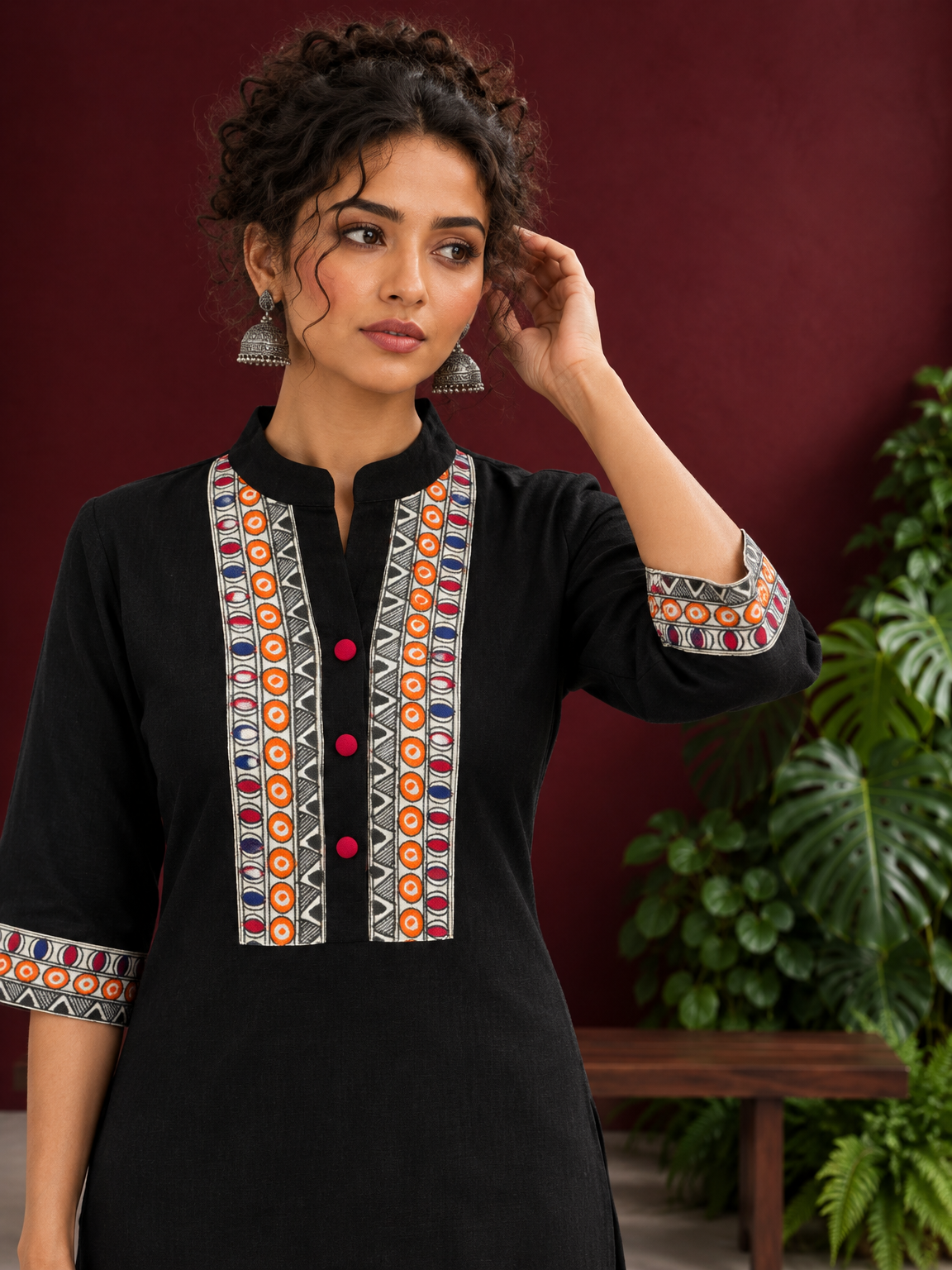 Classic Black Cotton Kurta with hand painted Madhubani neck panels & Matching Sleeve Cuffs — styled view — view 5