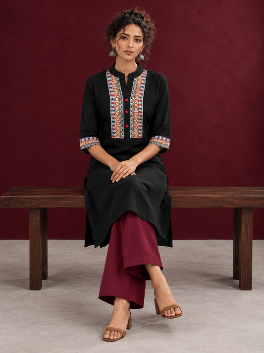 Classic Black Cotton Kurta with hand painted Madhubani neck panels & Matching Sleeve Cuffs — seated