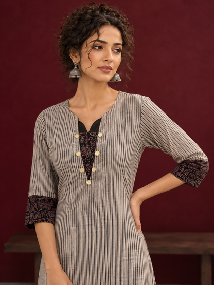 Elegant Beige Ajrakh Striped Cotton Kurta with Contrast Black Floral patch in Neckline & Sleeve Cuffs — fabric detail