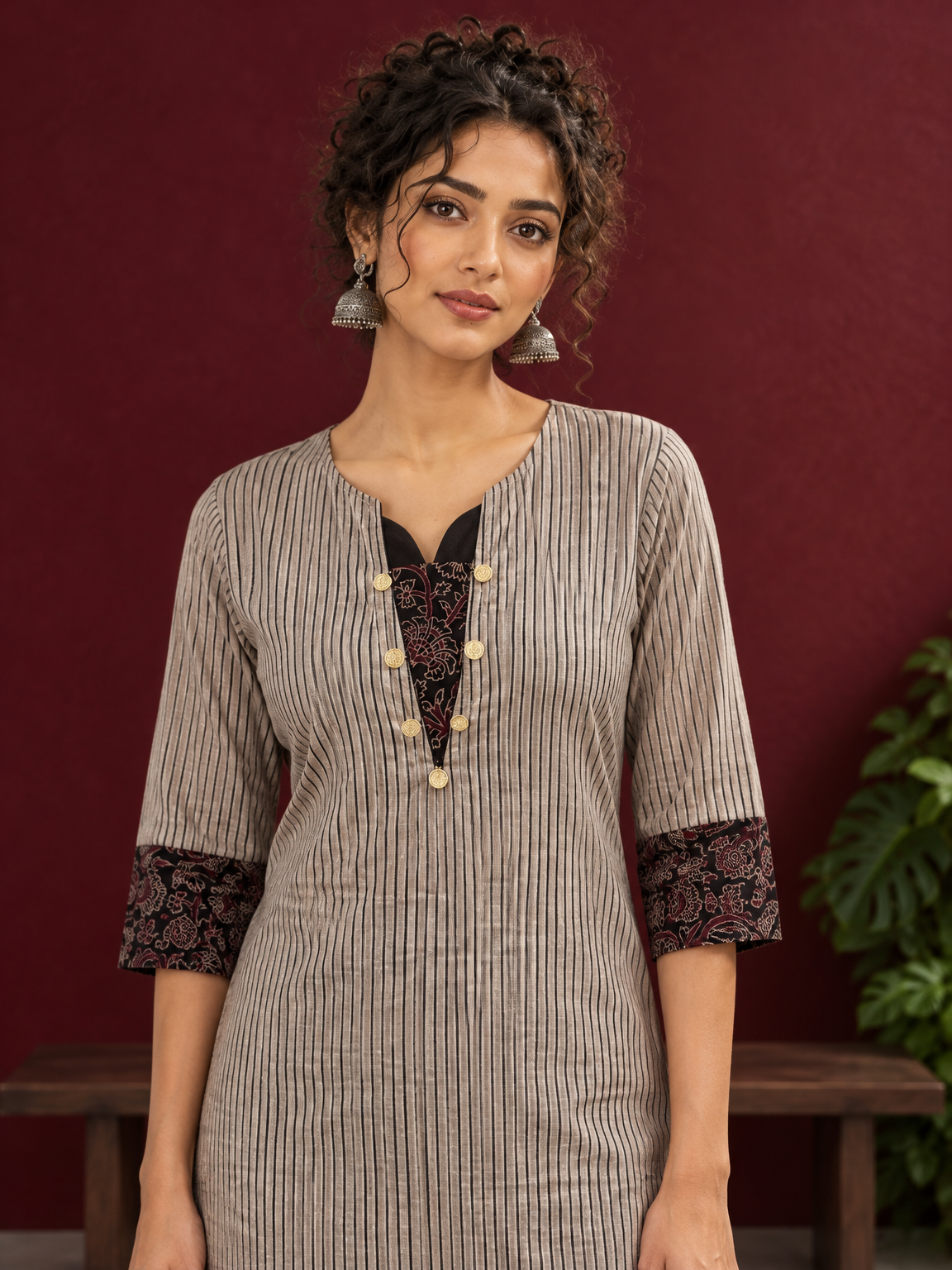 Elegant Beige Ajrakh Striped Cotton Kurta with Contrast Black Floral patch in Neckline & Sleeve Cuffs — styled view — view 5