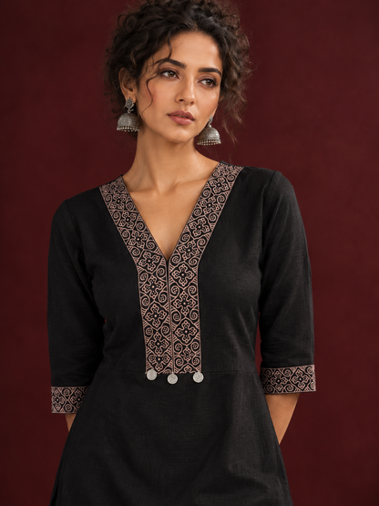 Timeless Black Cotton Kurta with Contrast Beige Ajrakh Printed V-Neck Panel & Matching Sleeve Cuffs — fabric detail