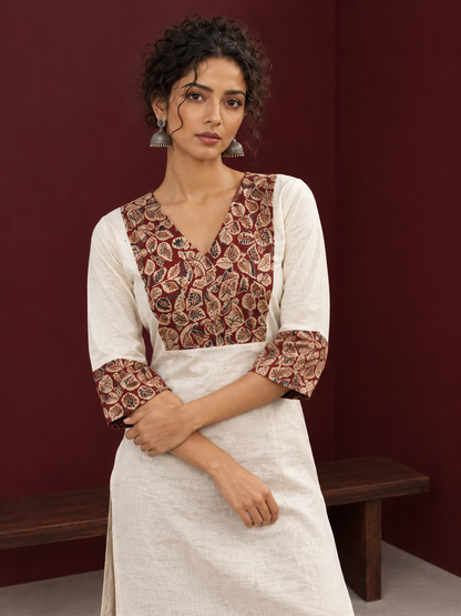 Elegant Off-White Cotton Kurta with Kalamkari Leaf Print Yoke and Contrast Cuffs — styled view