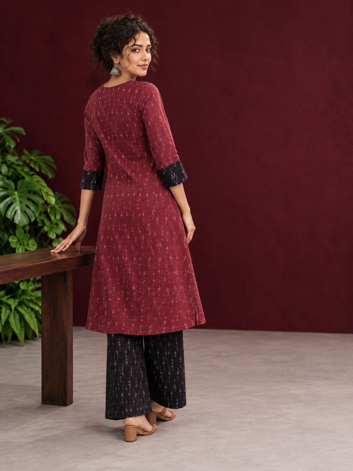 Elegant Maroon Ikat Cotton A Line Kurta With Black Yoke & Ikat Cuff Detailing — back view — view 6
