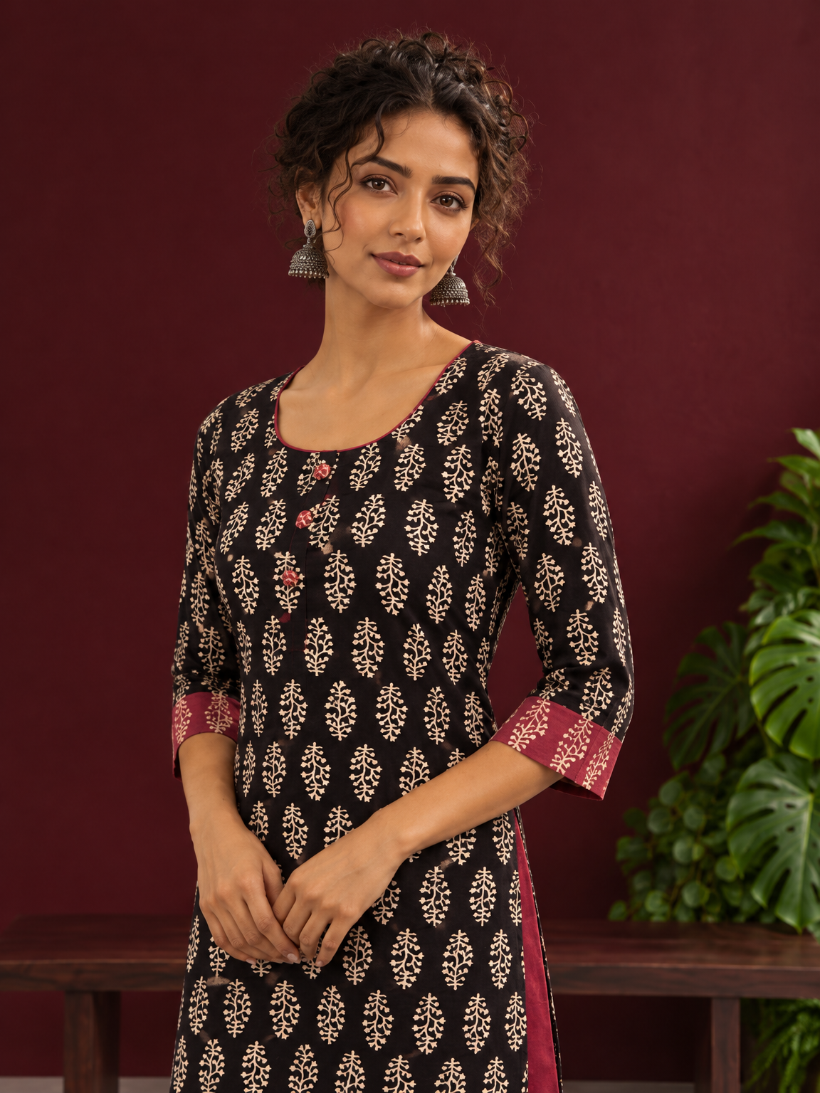 Elegant Black Cotton Ajrakh Kurta with Maroon Contrast Piping, Buttons & Ajrakh Floral Motif Print — styled view — view 4