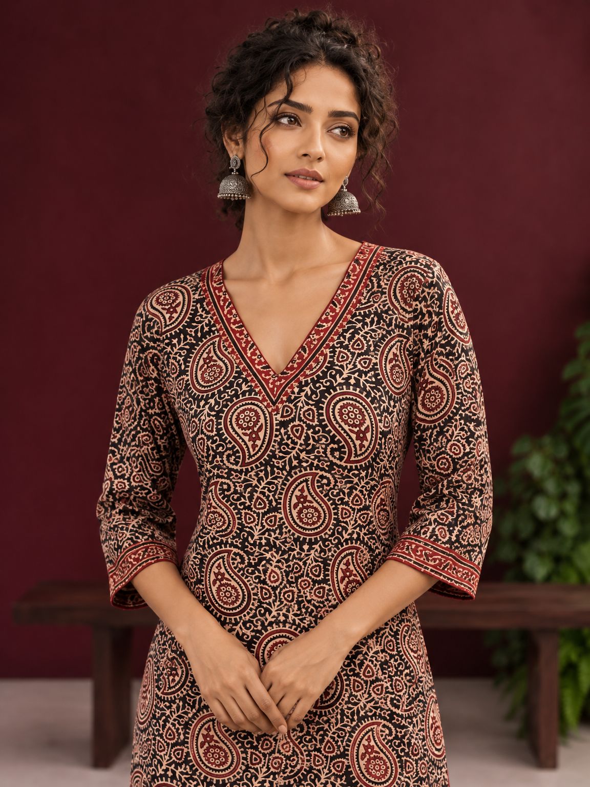 Black Cotton Ajrakh Print Kurta with Maroon Paisley Motifs and Contrast V-Neck Border — fabric detail — view 3