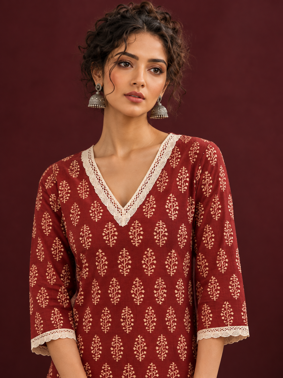 Maroon Cotton Ajrakh Kurta with Floral Motif Block Print and Crochet Lace V-Neck & Sleeve Cuffs — fabric detail — view 3