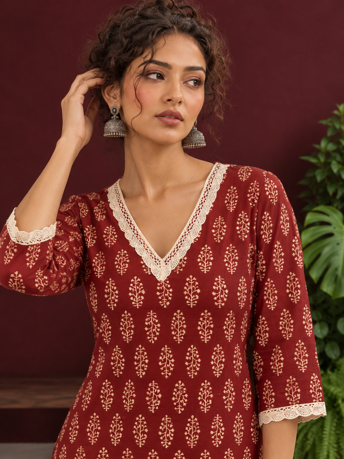 Maroon Cotton Ajrakh Kurta with Floral Motif Block Print and Crochet Lace V-Neck & Sleeve Cuffs — styled view — view 5