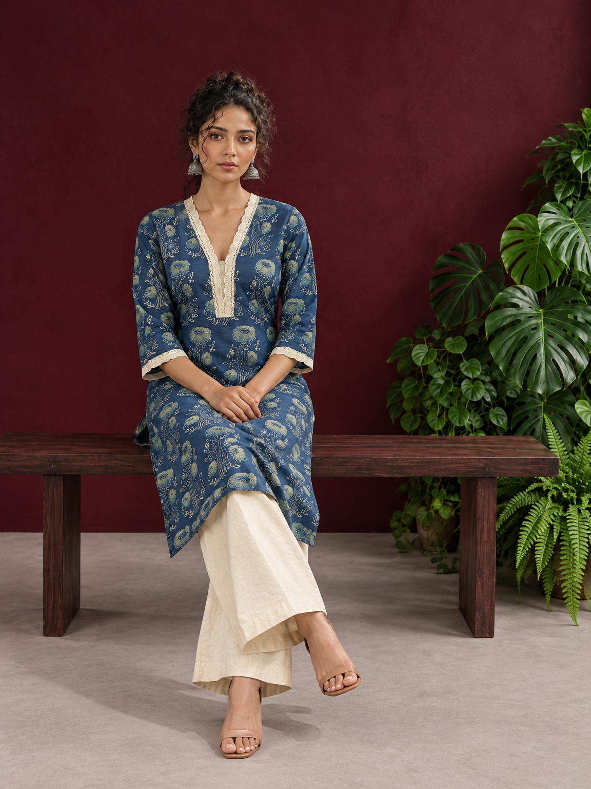 Elegant Indigo Blue Cotton Kurta with Floral Block Print and Crochet Lace V-Neck Trim — seated — view 6