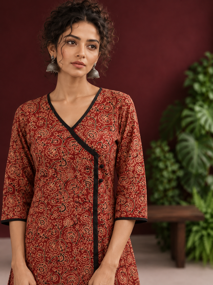 Maroon Cotton Kurta with Ajrakh Floral Print, Black Contrast Binding & Angrakha Style Wrap Front — fabric detail