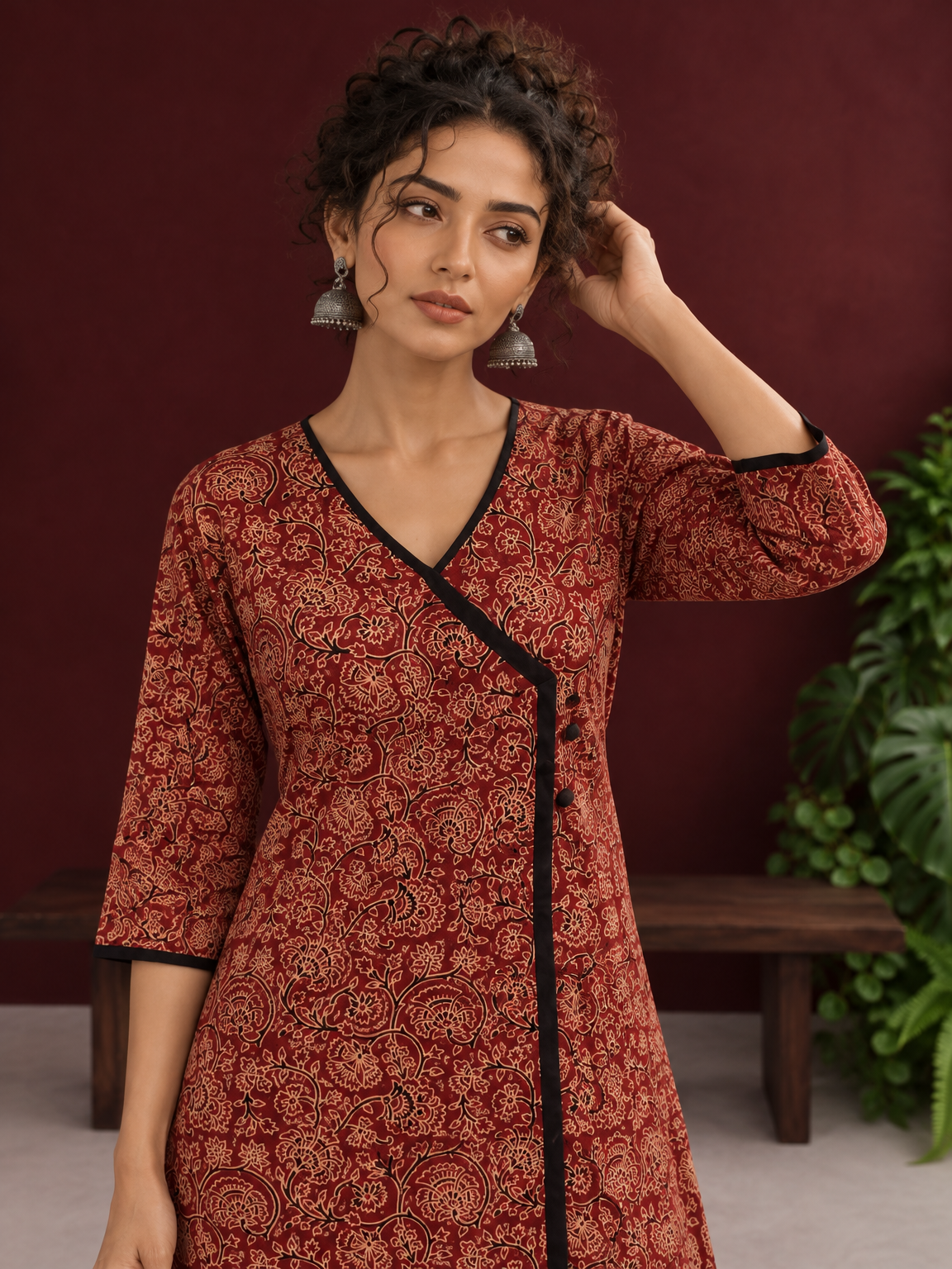 Maroon Cotton Kurta with Ajrakh Floral Print, Black Contrast Binding & Angrakha Style Wrap Front — styled view — view 5