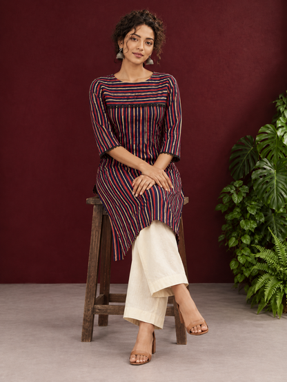 Classic Striped Cotton Kurta with Contrast Yoke Panel & Black Lace Trimmed Cuffs — seated