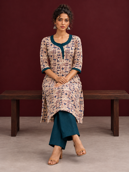 Beige Cotton Kurta with Tribal Motif Print & Contrast Teal Blue V-Neck Panel — seated