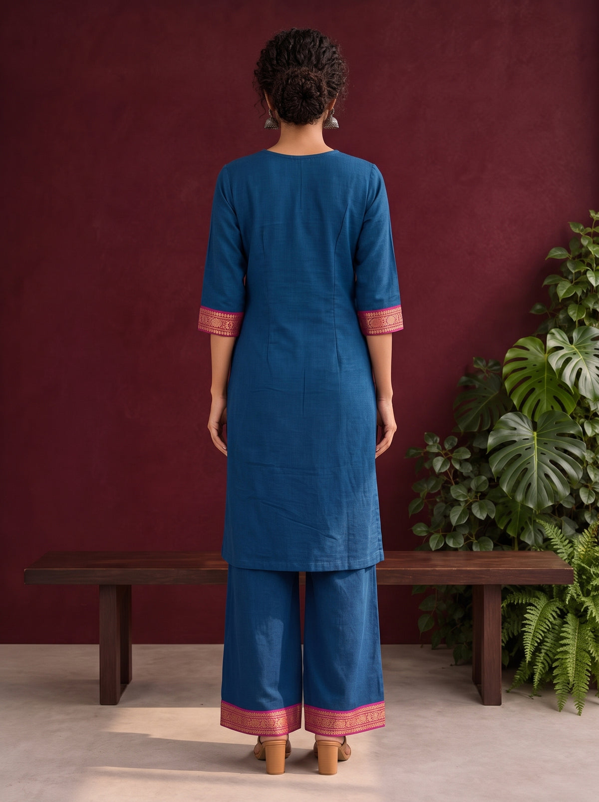 Elegant Peacock Blue Cotton Kurta with Contrast Pink & Gold Woven Border Neckline and Matching Salwar — back view — view 2