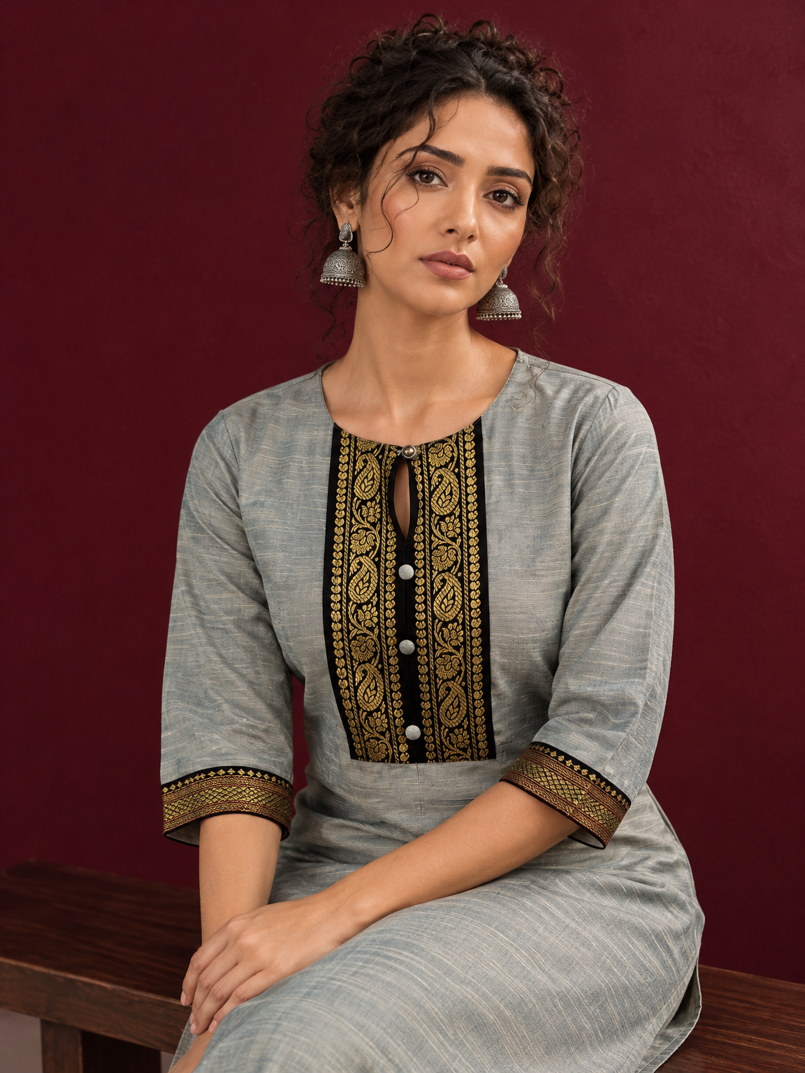 Elegant Sage Green Silk Kurta with Black zari Paisley Yoke & Contrast Sleeve Cuffs — seated detail — view 6