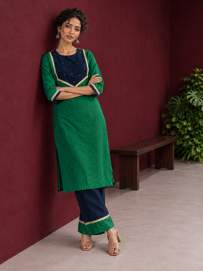 Elegant Green Silk Kurta with Contrast Navy Blue Yoke Panel, Sequin Embellishment & Gota Trim — side view